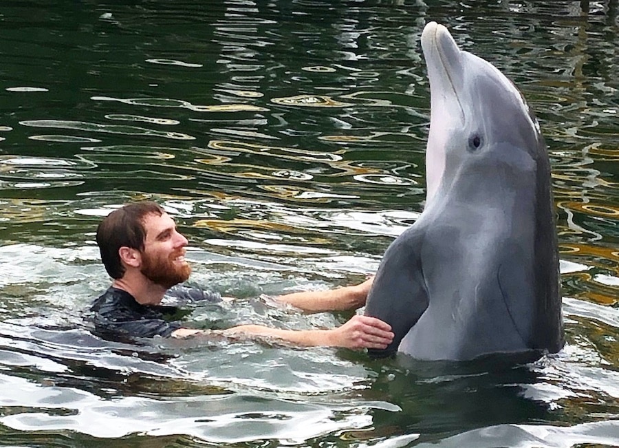 Alex Sweet with Dolphin