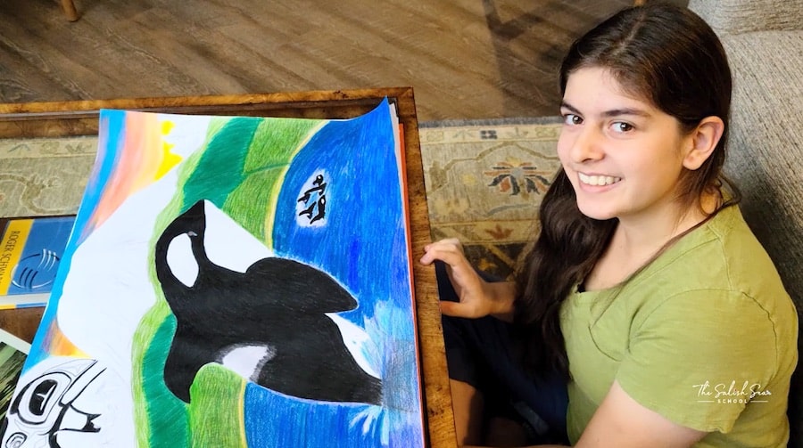 Fiorella De La O with colorful art of orca