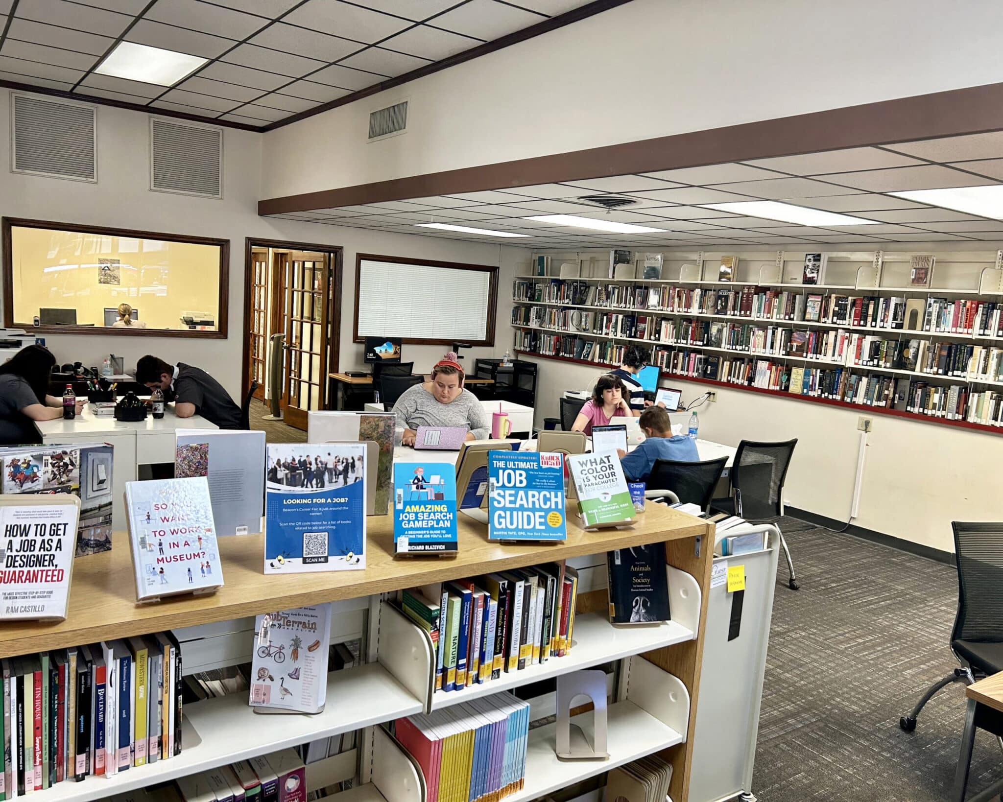 Students studying in the Beacon College Library.