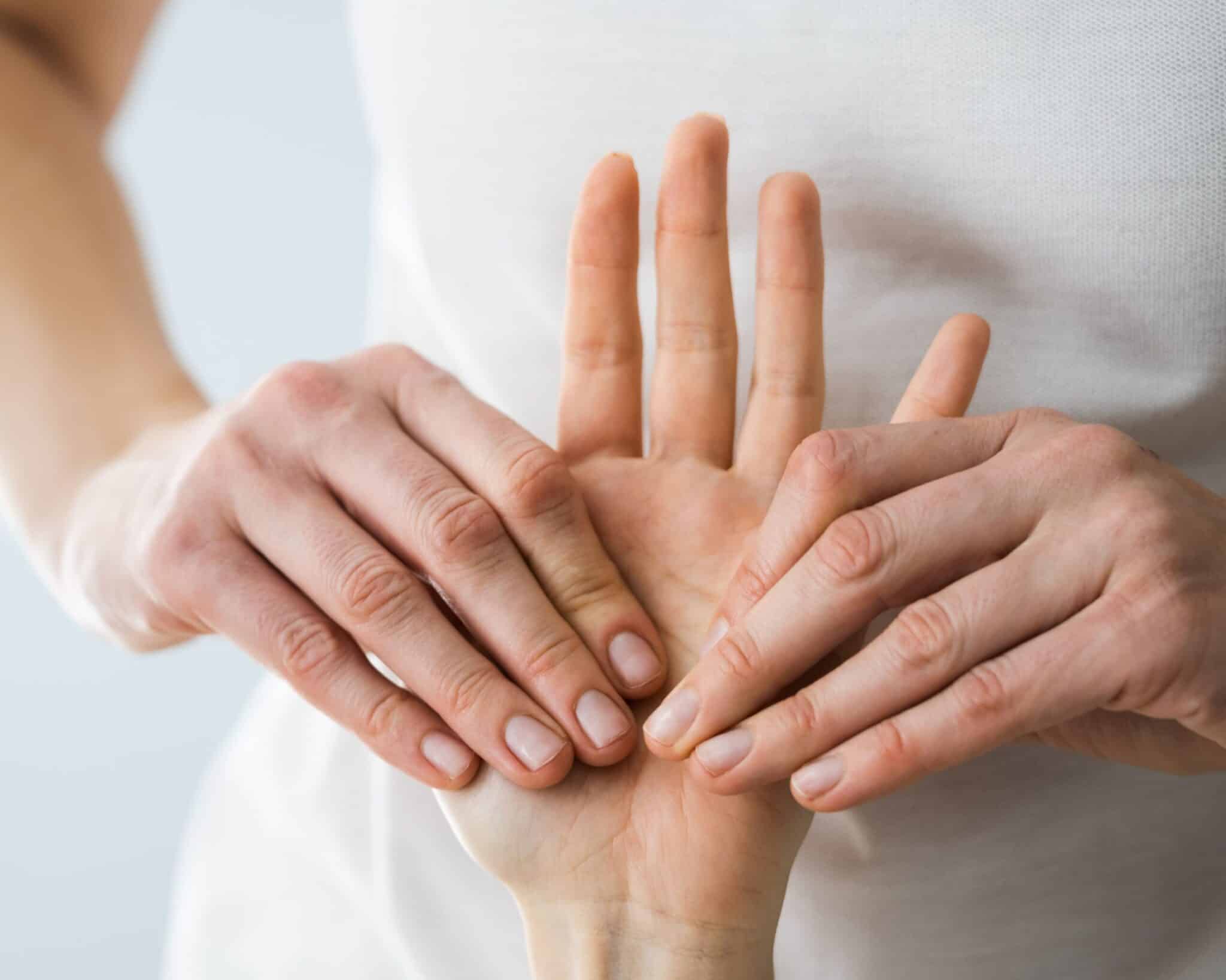 massaging hands for self care